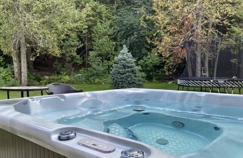 Thornbury House | Bright Chalet Chic with Hot Tub and Fire Pit