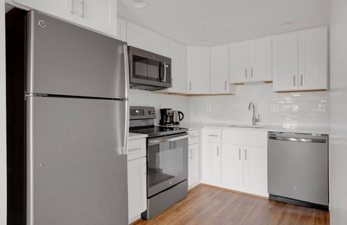 Court House Apartment | Bright Clarendon 1BR w/W/D & Gym, across street from WF, by Blueground