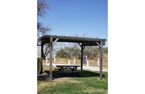 Rockport RV Rental | BRINGYOUROWNPARTY Set up camp across from a public beach and walk to heaven