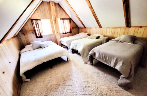 Garrison House | Brown Bass Cabin -Immersed in nature surrounded by mature trees.