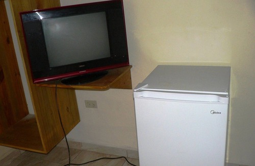 La Mulata Apartment | Budget hotel room in La Mulata, with fans/internet/cable TV/parking