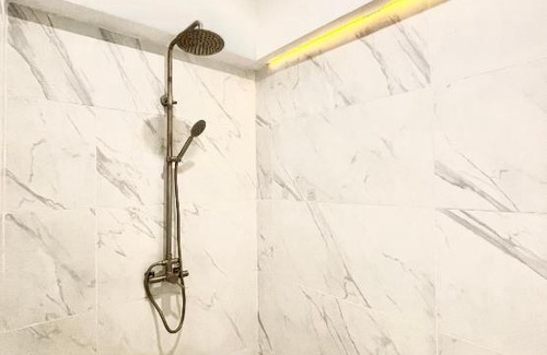 Paranaque Apartment | Burgundy Guest Suite