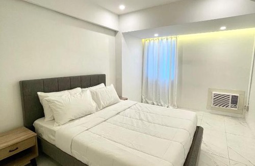 Paranaque Apartment | Burgundy Guest Suite