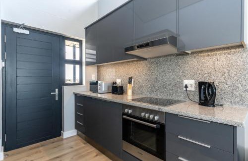 Milnerton Apartment | Burmeister 607 - Top Floor Corner 2 Bedroom Apartment with Sea and Lagoon Views - Onsite Parking