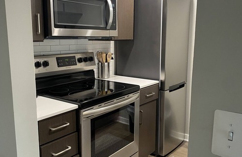 Cardozo Apartment | Buzzing H St Corridor penthouse Style Unit with Amazing Balcony and 360 View