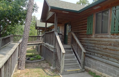 Mount Ida Cottage | C16, Two bedroom, two bath, log-sided Harbor North luxury cottage with hot tub overlooking Lake Ouachita. by RedAwning