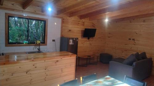 Pucon House | Cabañas tinajas y sauna Quetrupilina