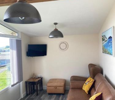 Llanybri Ski Chalet | Caban Cynnes- The Cosy Cabin, Holiday let, near Mansion House, Llansteffan