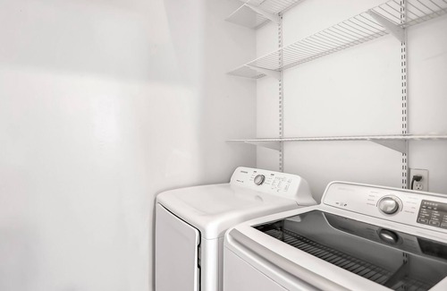 North Beach Condo | Calming dog-friendly with patio, pool, W/D, kitchen, & central AC - golf nearby