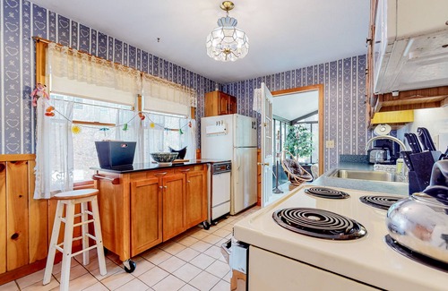 East Wakefield House | Calming dog-friendly lake view home with firepit, wood stove, patio, & gas grill