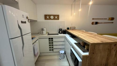 Camboinhas Apartment | Camboinhas Loft Vista Mar, Pé na Areia, com Piscina e Churrasqueira