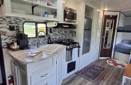 Sparta House | Camp Wee Acres. Cozy camper with beautiful views.