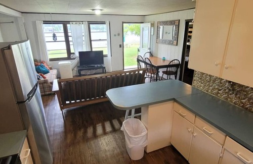 Alto Apartment | Campau Lake Sunshine Cottage with Tiki game house 4 King Beds