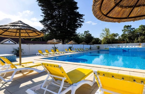 Saint-Jean-de-Monts Ski Chalet | Camping Flower La Davière Plage* - Chalet Cannelle Premium 26.5m² 2 bedrooms + TV + LV + Covered terrace + Pedestrian area 4 people