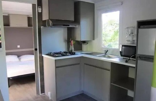 Mondragon House | Campsite La Pinède in Provence * - Mobile Home Olivier Plus 2 Rooms 2 People Air Conditioned + TV