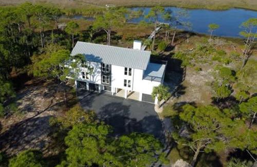 Plantation House | Canal- Bay Front family home 5-bedroom Sleeps 18 POOL coming soon Boat Dock