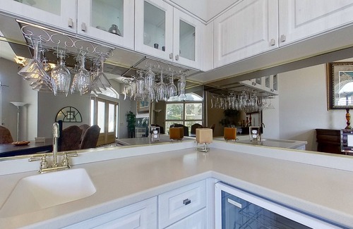 Edgewater House | Canal Front Home with Screened Pool/Spa, Entertainer's Patio & Grill + Fast WiFi