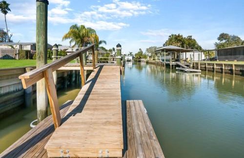 Butler Beach House | Canal Front Home! Walk to Beach, Porch, Fishing