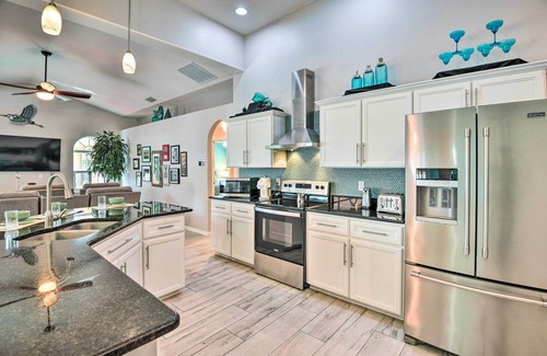 Palm Coast House | Canal-Front Palm Coast Home w/Pool, Theater Room!