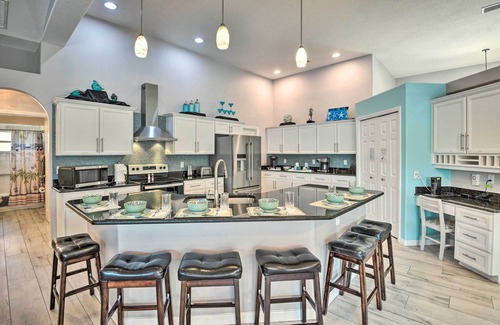 Palm Coast House | Canal-Front Palm Coast Home w/Pool, Theater Room!