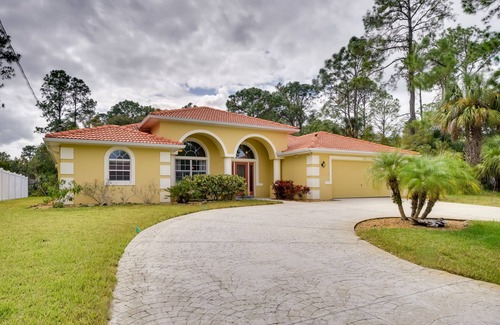 Palm Coast House | Canal-Front Palm Coast Home w/Pool, Theater Room!