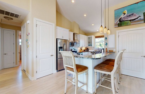 Cape Haze House | Canal-side monthly rental with private dock, heated pool, kayaks, & beach access