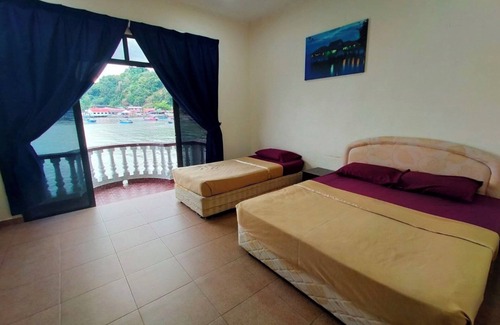 Kampung Batu Maung Hotel | Capital O 91118 Chalet Seri Idaman