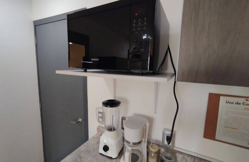 Zona Minerva Apartment | Capital O Tu Estancia