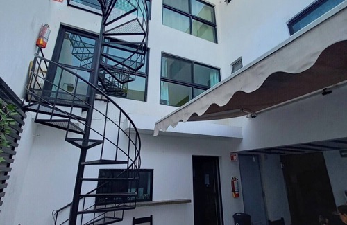Zona Minerva Apartment | Capital O Tu Estancia