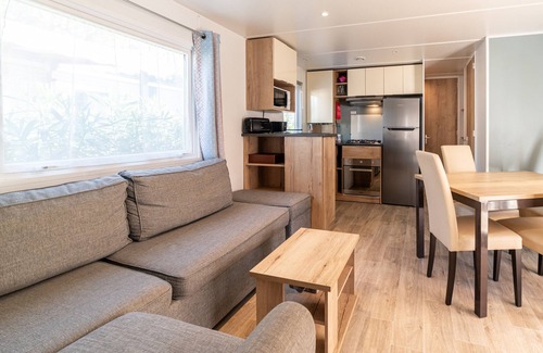 La Cote Radieuse RV Rental | Caravan 'Mobilhome Canet En Roussillon' with Mountain View, Shared Pool and Private Terrace