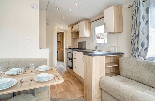 Bridport House | Caravan with one double and one twin.