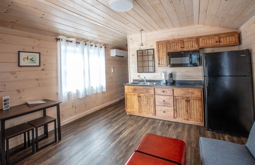 North Sebago Cabin | CARDINAL - RESORT WITH 12 PROPERTIES. NATURAL POND FOR SWIMMING. CAFE ON SITE.