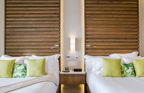 Punta Sam Resort | Caribbean Chic: 2 Bedroom Suite with Expansive Balcony & Resort Luxuries