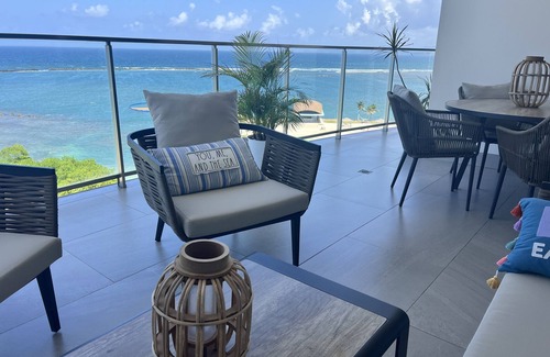 Bouvet Island Condo | Caribbean luxury with direct ocean, palms & white sand views in Playa Escondida!