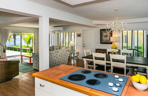 South Sound Villa | Caribbean Paradise – Beachfront Villa South Sound Beauty and Resort Amenities