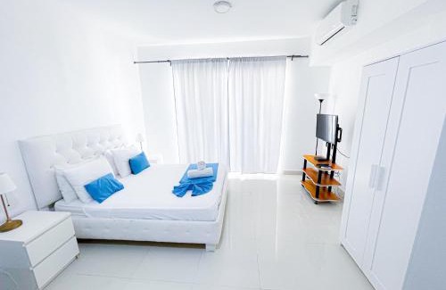 Bavaro Hotel | Caribbean WAVE DREAM BEACH Studios HOTEL with WiFi ROOFTOP POOL & SPA