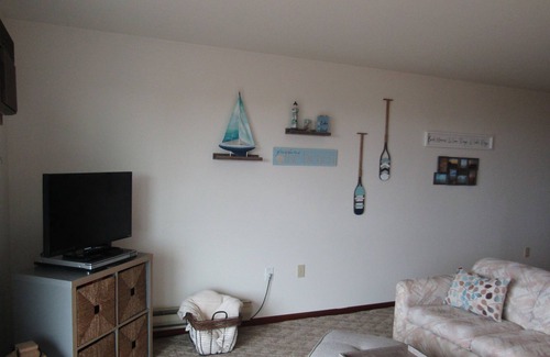 Au Sable Condo | Carpe Diem 365 located on Lake Huron sandy beach!