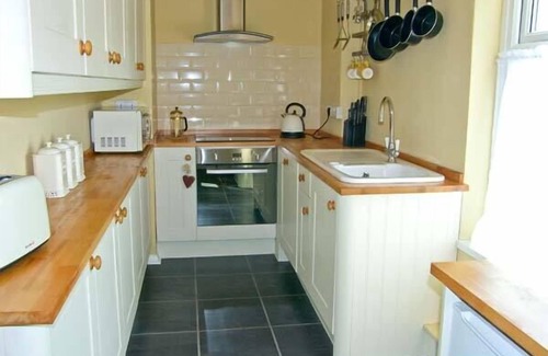 Bodorgan Cottage | CARREG RHYS, pet friendly, with hot tub in Malltraeth
