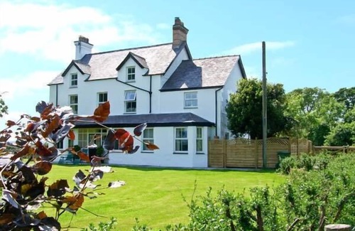 Bodorgan Cottage | CARREG RHYS, pet friendly, with hot tub in Malltraeth