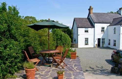 Bodorgan Cottage | CARREG RHYS, pet friendly, with hot tub in Malltraeth