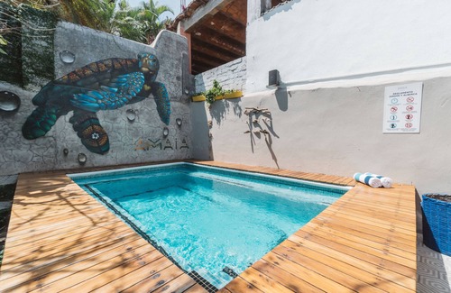 Sayulita Cabin | Casa Amaia on the main street and principal square of town.