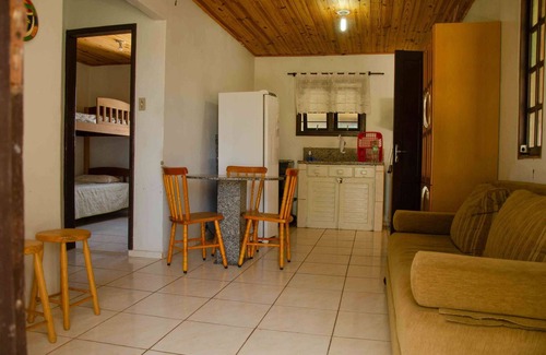 Passo de Torres House | Casa Aventura in front of the beach, internet, two bedrooms, covered garage and patio