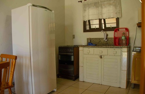 Passo de Torres House | Casa Aventura in front of the beach, internet, two bedrooms, covered garage and patio