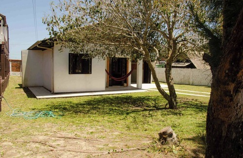 Passo de Torres House | Casa Aventura in front of the beach, internet, two bedrooms, covered garage and patio