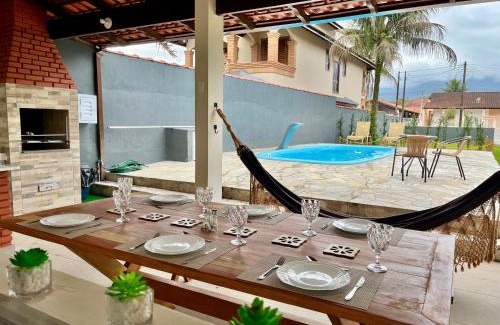 Balneario Mogiano House | Casa com piscina 500m da praia condomínio Morada da Praia