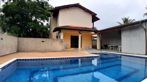 Morada da Praia House | Casa com piscina condomínio Morada da Praia Boraceia - Bertioga