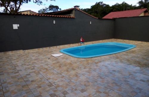 Peruibe House | Casa com piscina em condomínio fechado