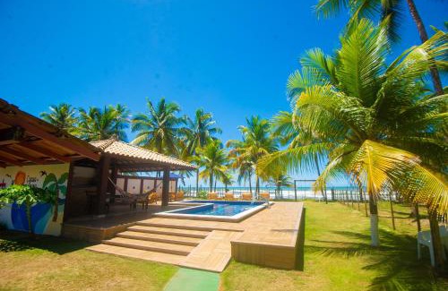 Olivenca Apartment | Casa completo com grande piscina sob coqueiros, pe na areia