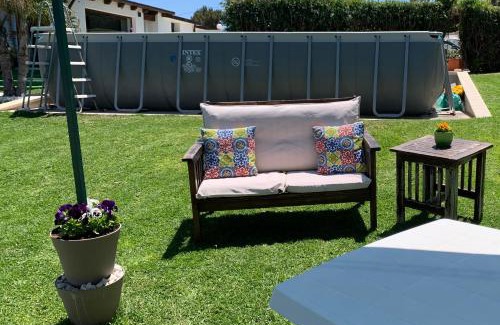 Isola Apartment | Casa con piscina e vista mare dal giardino