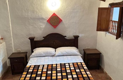 Curiti House | Casa Cuadros